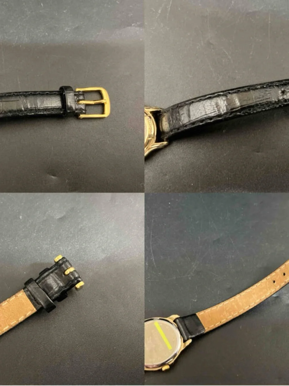 Burberrys Gold Tone Round Watch with Black Leather Strap